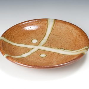 James Hake Ceramics - Bowl shino glaze with iron cross.